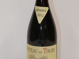 a bottle of wine that is sitting on a table