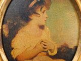a picture of a young girl holding a cat