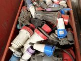 a red box filled with assorted electrical tools
