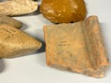 many rocks that are sitting on a table