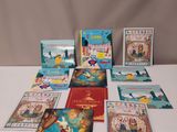 un assortiment de livres pour enfants sur une table blanche