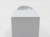an apple watch sitting on top of a white box on a white surface