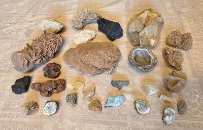 a lot of different types of rocks on the table