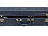two pieces of luggage sitting on top of each other