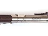 an image of a flashlight with a cord attached to it on a white surface