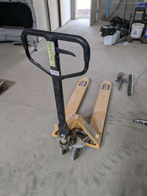 a pallet that is sitting in the middle of a room