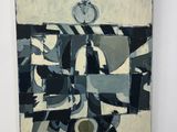 un tableau accroché au mur, sur lequel figure une horloge