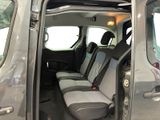 the interior of a van with the door open and the passenger seat down