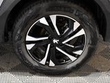 a close up of a tire on a car ' s rim