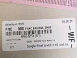 a label on the back of a laptop that says fnc