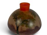 a vase with a painting of a tree on it