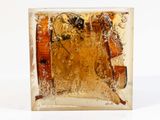 a glass block with a picture of a woman on it