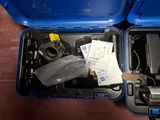 a blue case with a couple of tools inside of it