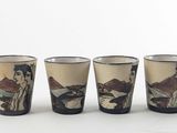 six verres à shot sur lesquels figurent l'image d'un homme et d'une femme