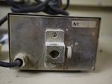 a metal device that is sitting on a table