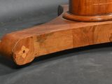 a wooden table with a clock on top of it