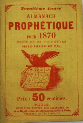 un vieux livre sur lequel est posé un oiseau