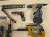a lot of tools that are sitting on a table