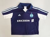 a blue and white shirt with the name ericsson on it