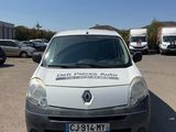 a white van that is parked in a parking lot