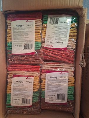 several packages of macaroni sitting in a box on top of a table