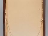 an old wooden easel with a white canvas on top of it