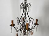 an image of a chandelier hanging from a ceiling in a room