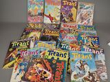 a bunch of comic books sitting on top of a table
