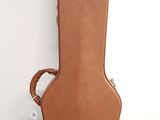 an image of a guitar case sitting on top of a blue floor
