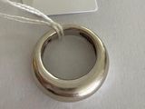 a silver ring with a tag attached to it