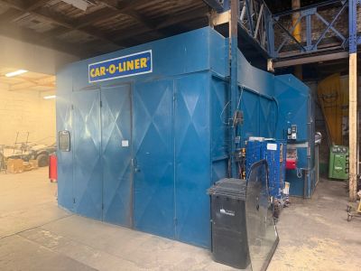 a large blue machine that is in a building