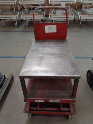 a metal table with a red box on top of it