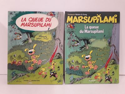 deux livres posés sur une surface blanche, surmontés d'une bande dessinée
