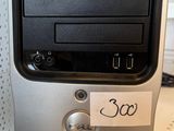 a computer on a shelf with a price tag on it