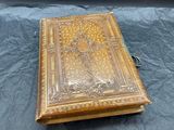 an old book that is sitting on a table