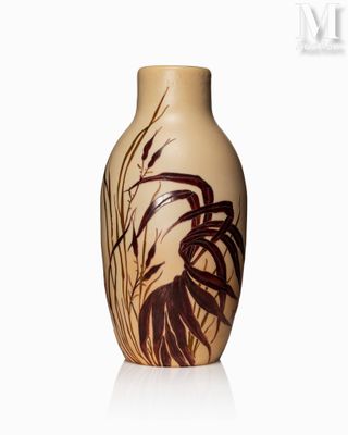 a vase that has a picture of a bird on it