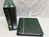 an image of a green binder and a green book on a white background