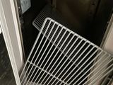 a metal gate in the middle of a room
