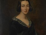 portrait of a woman in a black dress with a blue shawl