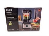 the box of a blender is open on the counter