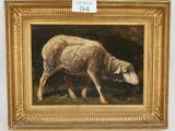 painting of a sheep in a gold frame on a white wall