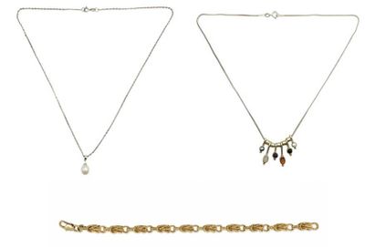 three necklaces and a bracelet are shown on a white background
