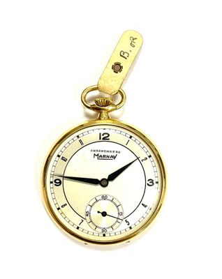 a gold pocket watch with a chain hanging from it