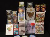a lot of video games and games on the table