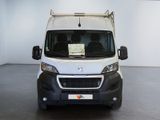 a picture of a white van parked in a garage
