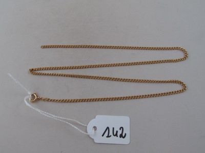 two gold chains with a tag that says ww on them