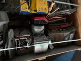 a box full of assorted electronics and other items