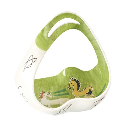 un sac à main vert et blanc orné d'un cheval