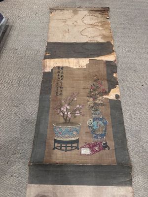 a long piece of fabric with a painting on it