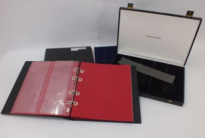 three red and black binders are sitting on a white surface